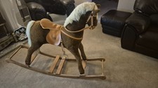 Large wooden Mammas and Papas  rocking horse on a solid wooden stand