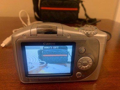 Canon PowerShot SX100 IS 8MP Digital Camera w/10x Zoom PC1256 w
