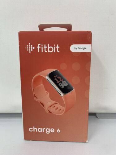 Fitbit Charge 6 Activity Fitness Tracker with Google apps Coral Strap Gold Case