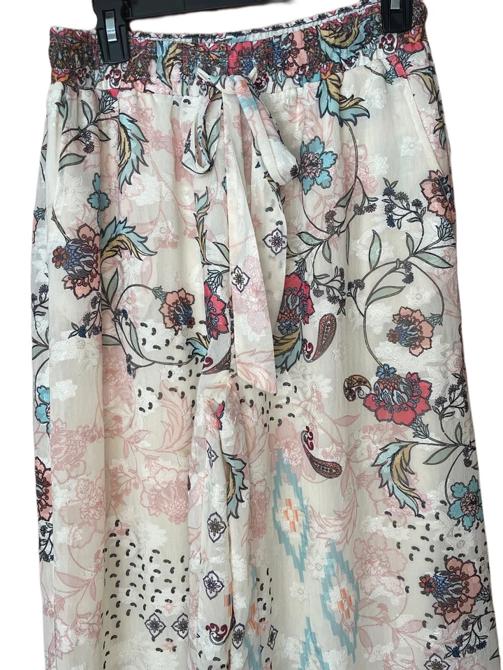 Pantalones Reba para mujer blancos con superposición floral talla mediana  Foto 3 de 4
