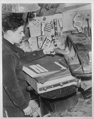 Aero Leather Coat Company, Inc. : Stamping horsehide suspender straps /