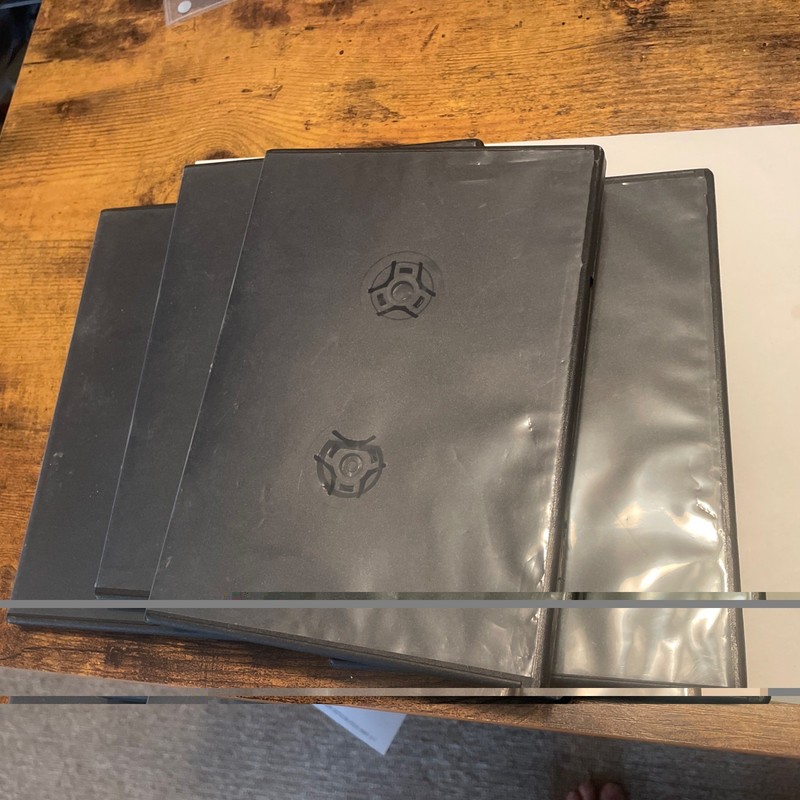 Lot Of (4) Quadruple Capacity Hard Plastic Dvd Cases. Each Holds 4 Discs