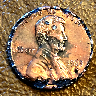 1993 Lincoln Shield Cent Error Coin struck on Dime Planchet Clad