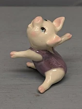 Retired Hagen Renaker Aerobic Pig Sitting w/ Arms Out in Purple Outfit
