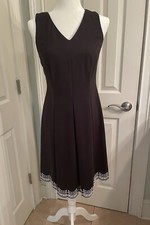 Talbots 4 Petite black sleeveless dress Fit & Flare & embroidered Hemline EUC