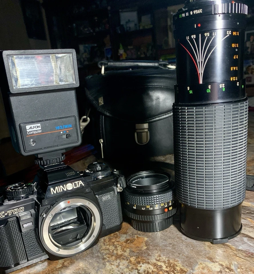 Cámara fotográfica Minolta X-700 35 mm MD 50 mm F 1,7 y 49 mm lente UV y lente zoom extendido Foto 2 de 4