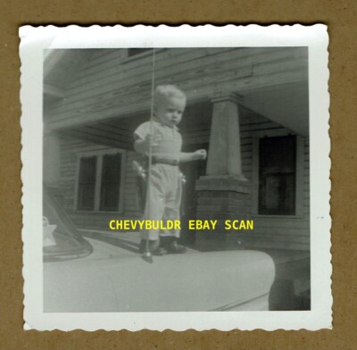 Little Guy in His Cowboy Boots with Holster Standing on Car Vintage Photograph