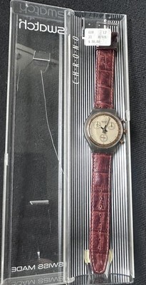 Swatch Watch Chrono 1991 SCM100  Goldfinger  Unworn With Box and Papers