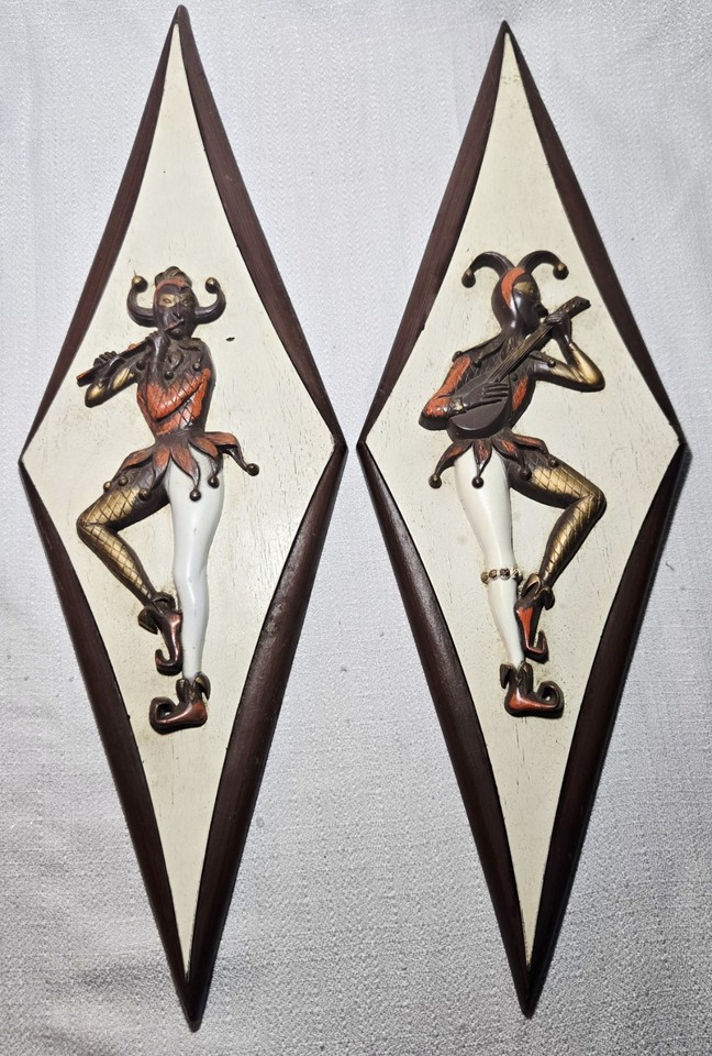 1960s Burwood diamond-shaped Harlequin Jester wall plaques — graphic, geometric, and genuinely weird in the best possible MCM way.