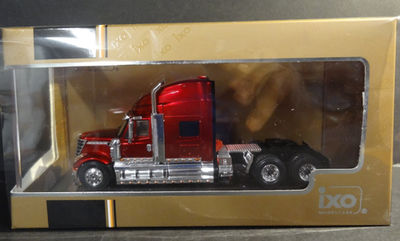 Miniature IXO 1/64 International Lonestar 2010 Rouge Foncé - NEUVE Sous Blister