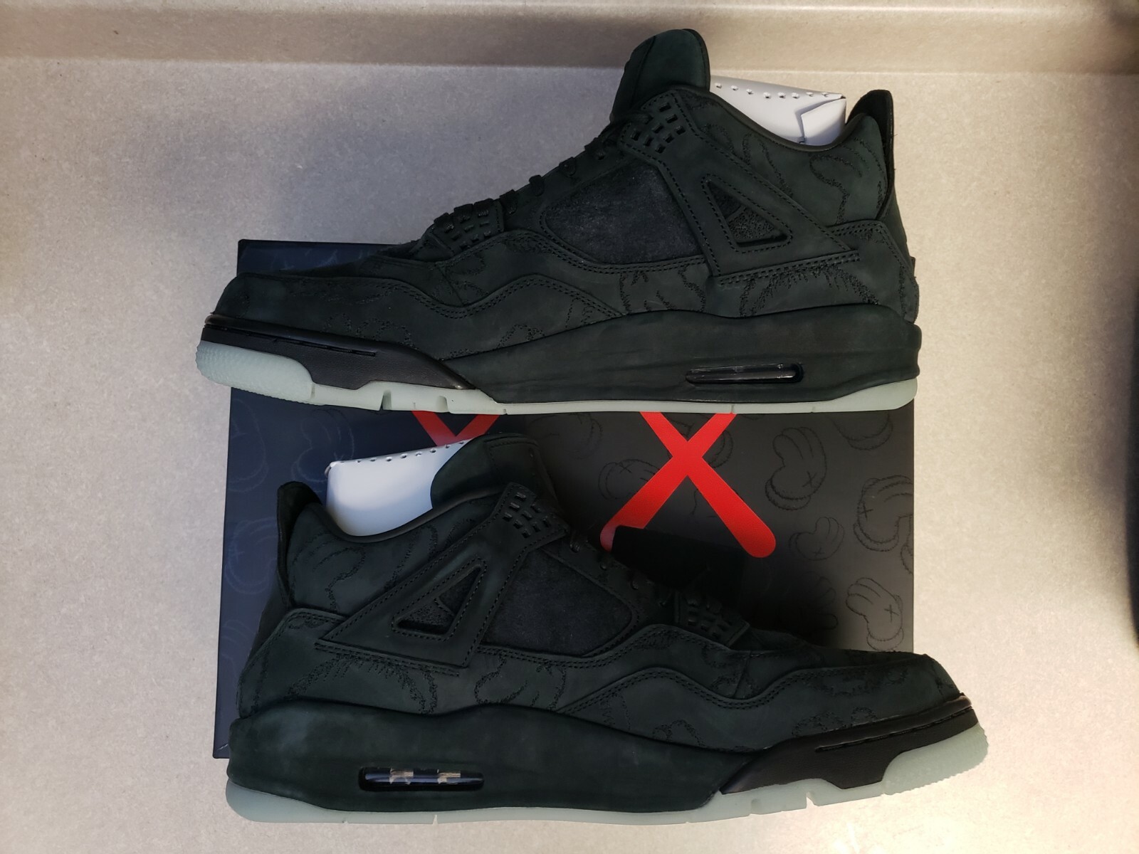 air jordan 4 retro kaws black