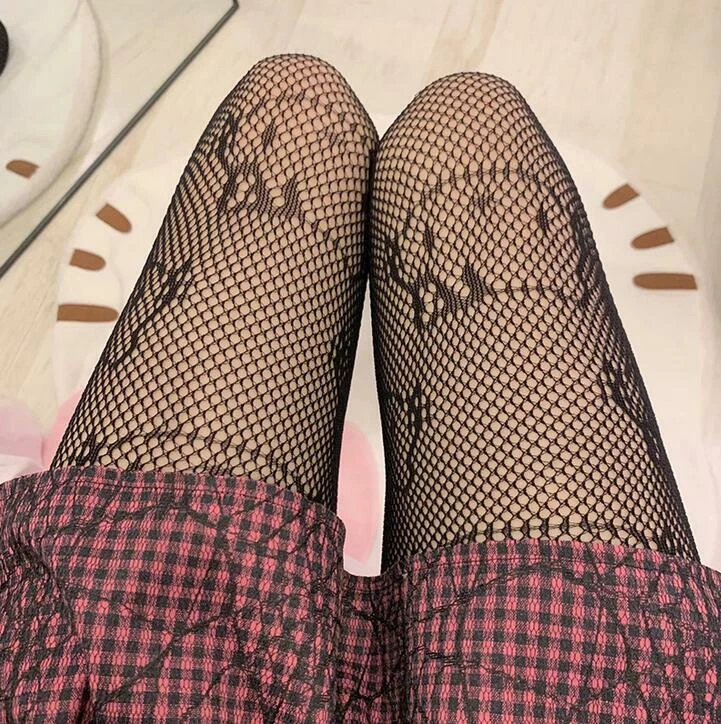 Fishnet tights and knee-highs