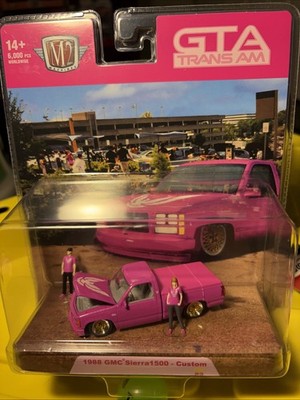 M2 Machines Diorama Pink & Gold 1988 GMC Sierra 1500 Custom GTA Trans AM