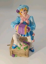 Vintage 1994 Schmid Yamada Girl playing accor...