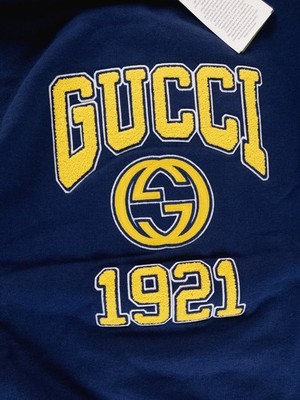 GUCCI navy blue hoodie with yellow 1921 interlocking G logo Size