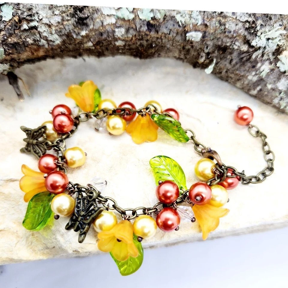 手工小饰品手链橙色花卉珠、叶子和青铜蝴蝶小饰品 — 第 2/3 张图片