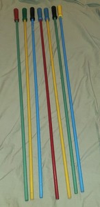 7 vintage multi color wooden 35" carnival walking sticks, canes. game prizes