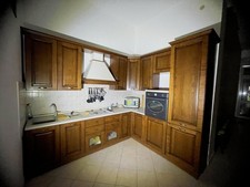 Cucina completa  ad angolo  in arte povera marca Claris colore noce