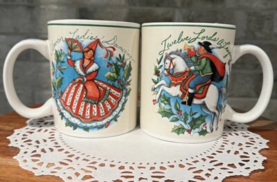 2- Susan Winget The Twelve Days Of Christmas Mug Cup ( 11 Ladies - 12 Lords )
