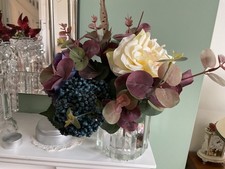 per owned  bunch of artificial flowers