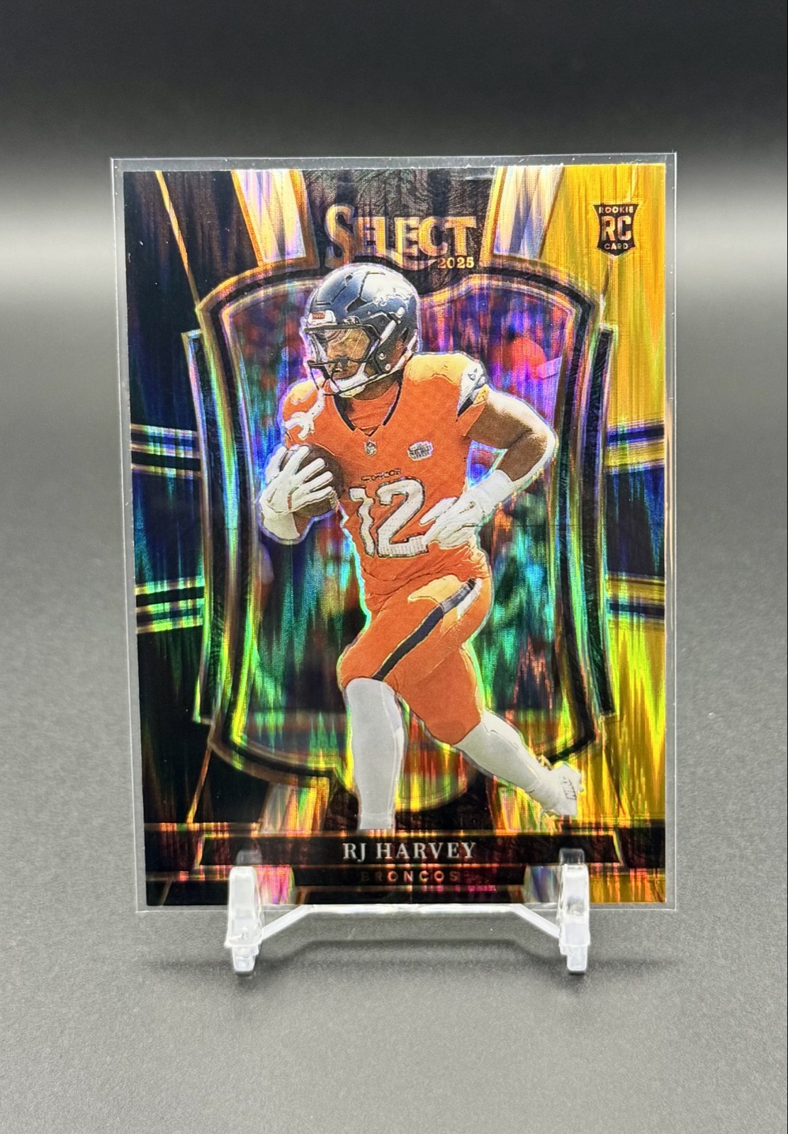 2025 Panini Select - Premier Level RJ Harvey #110 Black & Gold Shock Prizm (RC)