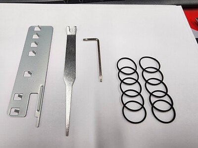 Original XBox 360 Opening Tool, X Clamp Tool, and 10 Belts.