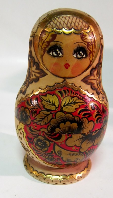 Six colorful Russian nesting dolls, perfect condition.