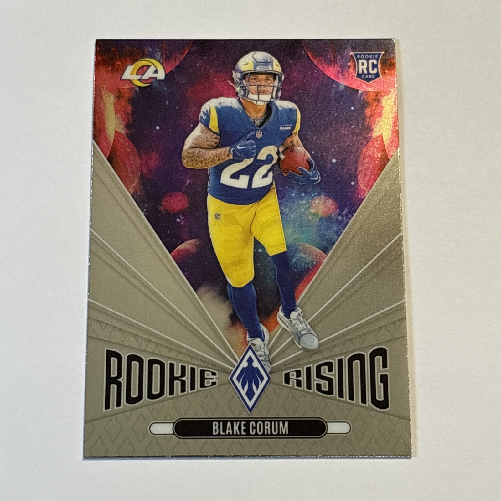 Blake Corum 2024 Panini Phoenix Rookie Rising Insert Rookie Card #12 Rams
