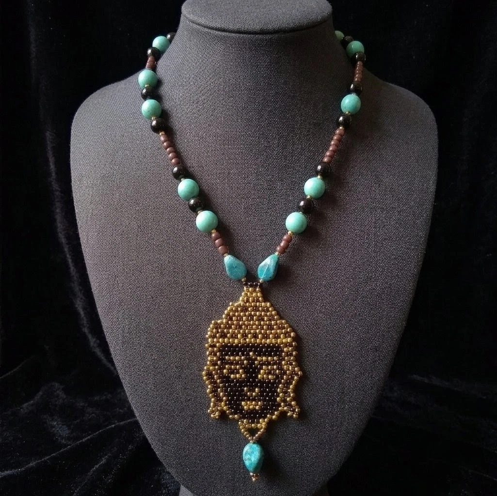 Collana con ciondolo dell'illuminazione in acciaio inossidabile con design vintage Buddha Stones Buddha seduto sul loto di Buddha