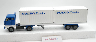 Tekno Volvo Zugmaschine mit Auflieger + 2 / 20ft Container Volvo Trucks  (26060)