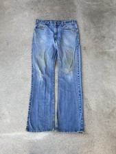 Vintage 80  s Levi  s 517 Orange Tab Bootcut Flare Distressed Patched Jeans 35x32