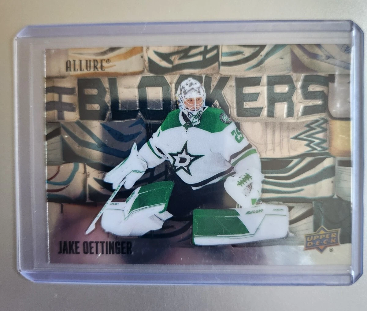 22-23 Upper Deck Allure Jake Oettinger Blockers Insert.