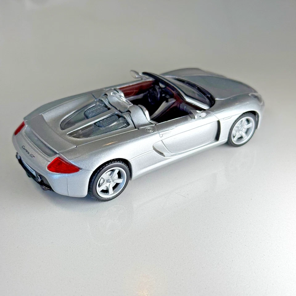 ALTA VELOCIDAD 1:43 Porsche Carrera GT - Plateado Metálico, Die-Cast, LIMPIO Foto 2 de 4