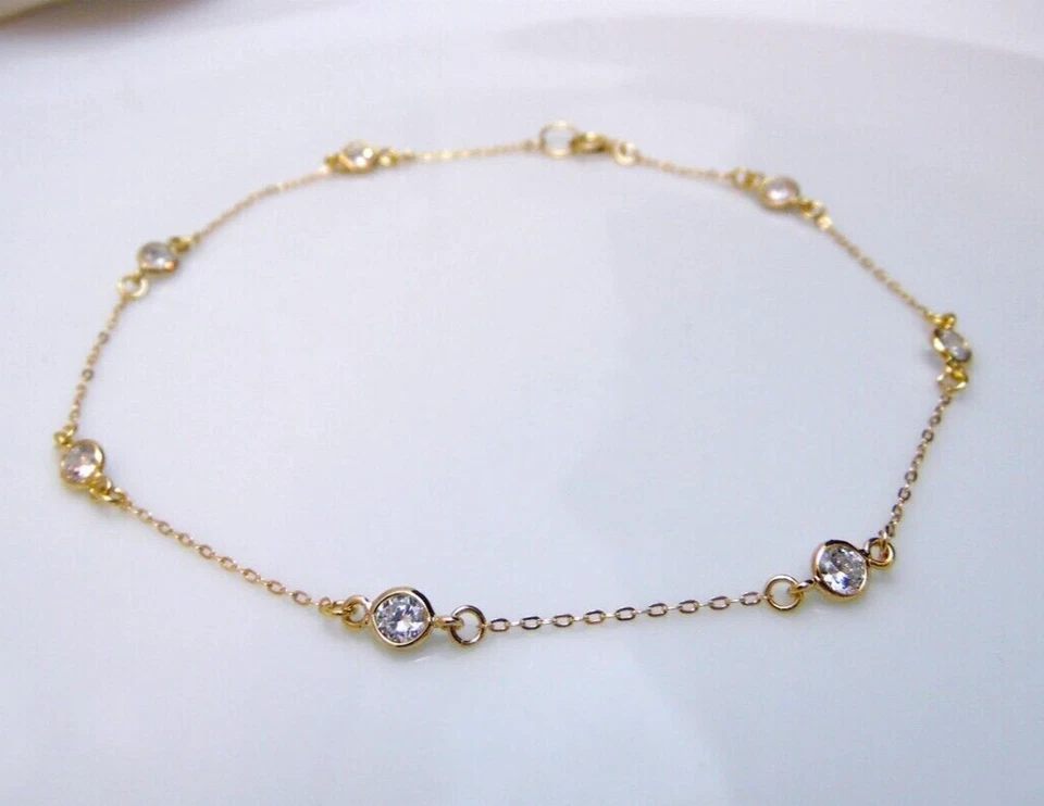 Juego de bisel de moissanita VVS1 corte redondo de 5,5 quilates estación tobillera chapada en oro amarillo de 14 quilates Foto 2 de 4