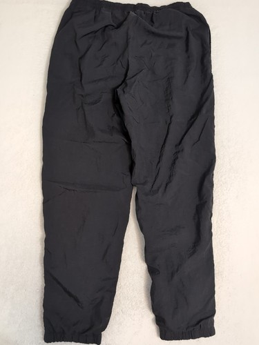 Pantaloni a vento Nike vintage anni 90 foderati pantaloni pista zip alla caviglia neri UOMO M 30x30 - Foto 10 di 11