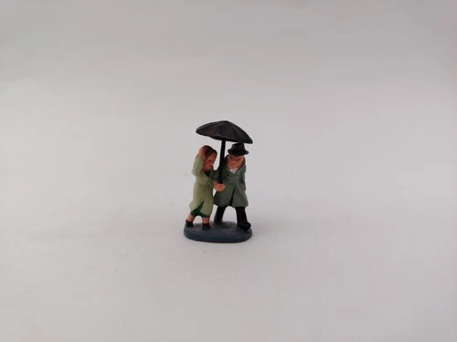 J. Carlton & Gault Couple with Umbrella