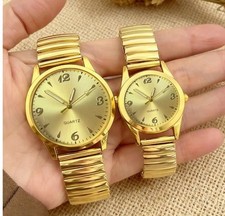 His and Hers pair, expanding strap quartz watches.