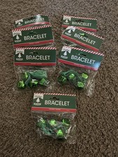 Green Christmas Bells Bracelets set of 7 holiday jingle bells festive musical