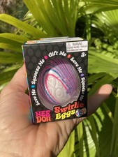NeeDoh NEE Doh Swirlie Egg, Squishy Egg Swirly , Easter Pink/Blue/White