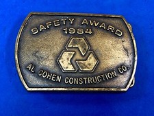 Vintage 1984 AL Cohen Construction Company promotional belt buckle safety award