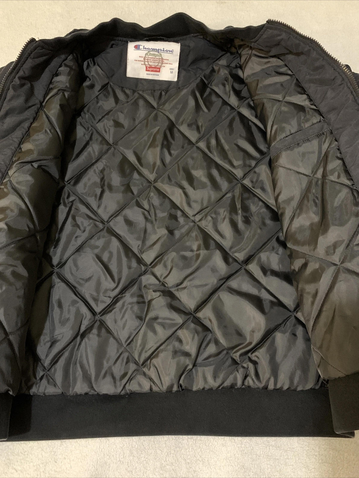 Rare veste noire Supreme Champion taille M adulte en excellent état