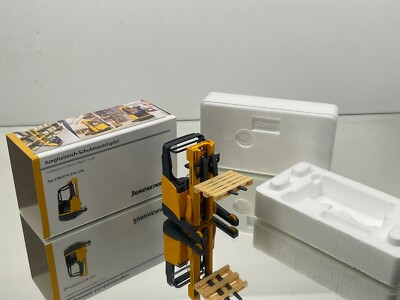 CONRAD 2788/0 JUNGHEINRICH TYP ETM/ETV 214-216 REACH TRUCK -1:25- GOOD IN BOX