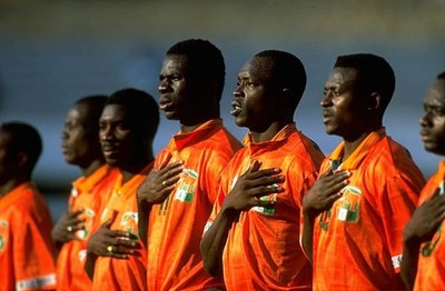 The Ivory Coast Team sing their national anthem before a match Afr- Old Photo