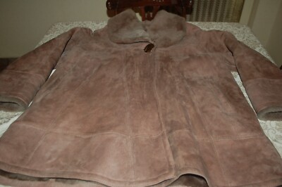 Brown inverted sheepskin, see measurements, used