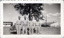 WW2 Photo of Four Soldiers Standing by Tree at Military Camp