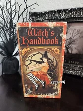HALLOWEEN FLYING WITCH'S HANDBOOK FAUX BOOK DISTRESSED STASH BOX 9" X 4.75"