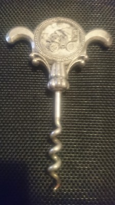 antique cap opener 