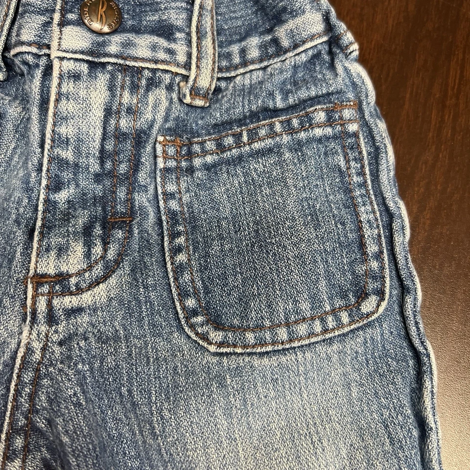 Pantalones de mezclilla para bebé Y2K Riders de colección azul bolsillos desgastados lavado unisex infantil 18 M Foto 3 de 4