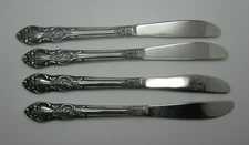 Imperial Stainless Japan IMI 4 Pattern Floral Scroll Set 4 Dinner Knives