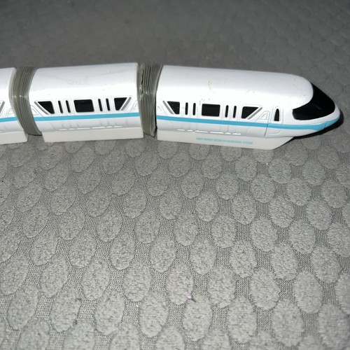 Genuine Disney 4 Piece Die-Cast Teal Stripe Monorail Metal Set - Picture 2 of 7